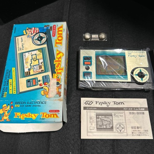 Bandai frisky tom lcd gioco - tom,